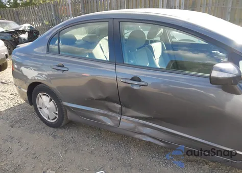 2010 Honda Civic Hybrid from USA, damaged, VIN JHMFA3F23AS003884